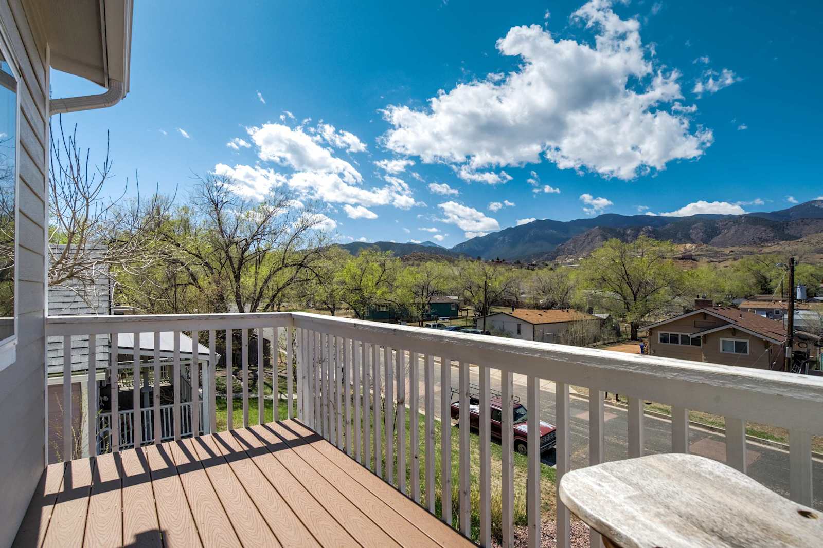 Welcome to Power Haus! Step out onto the upper deck and soak in the sweeping mountain views—perfect for morning coffee or golden hour relaxation..